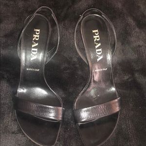 Black slingback Prada pumps